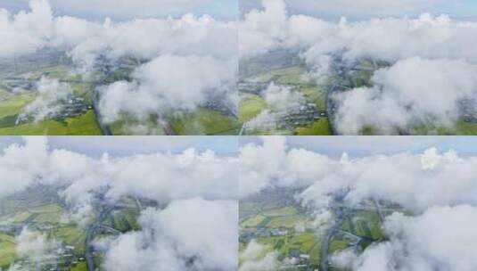 航拍云层下的田野高清在线视频素材下载