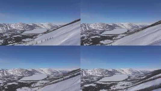 航拍新疆冬季喀纳斯河流晨雾雪山森林雪景高清在线视频素材下载