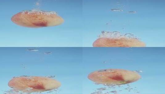 2K竖屏高速摄影一个水蜜桃落水中高清在线视频素材下载