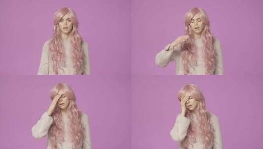 粉色头发女孩表演遗憾情绪高清在线视频素材下载