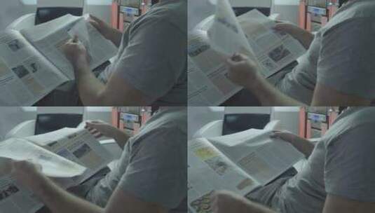 男人看报纸高清在线视频素材下载