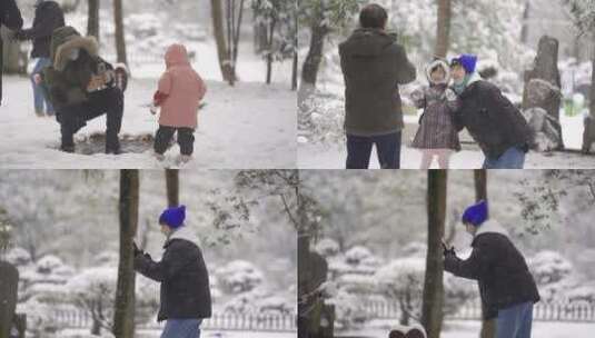 雪地里快乐拍照的家人高清在线视频素材下载