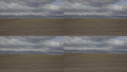 俄罗斯西伯利亚平原汽车行驶远处冰原高清在线视频素材下载