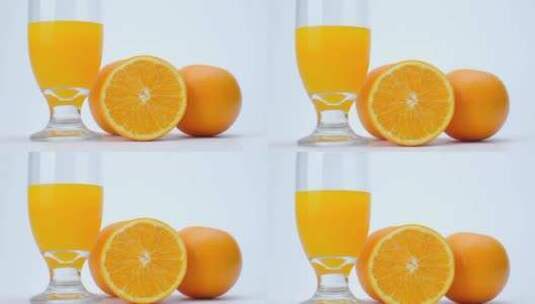 白色背景上的水果和橙汁高清在线视频素材下载