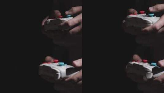 男子玩视频游戏控制器高清在线视频素材下载