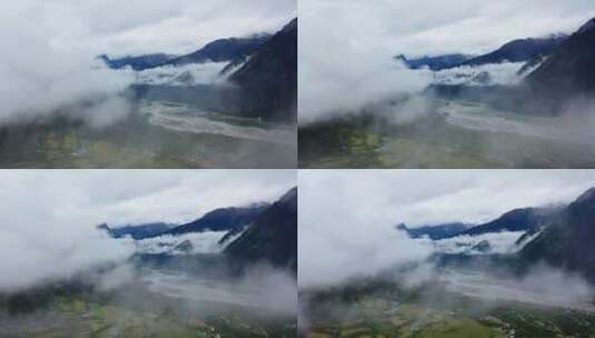 航拍云雾缥缈的嘎朗村风光高清在线视频素材下载