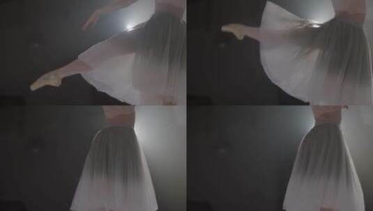 穿着长裙踮着脚尖跳舞的芭蕾舞女演员高清在线视频素材下载