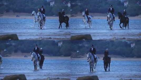 威海西海岸日落湾沙滩上练习马术的骑马人高清在线视频素材下载