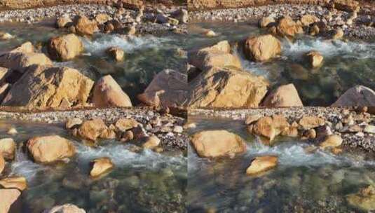 干净的水流流过石头高清在线视频素材下载
