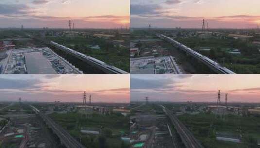 夕阳下高铁驶过航拍高清在线视频素材下载