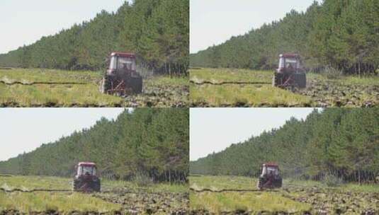 黑龙江北大荒拖拉机在水稻田里秋翻地高清在线视频素材下载