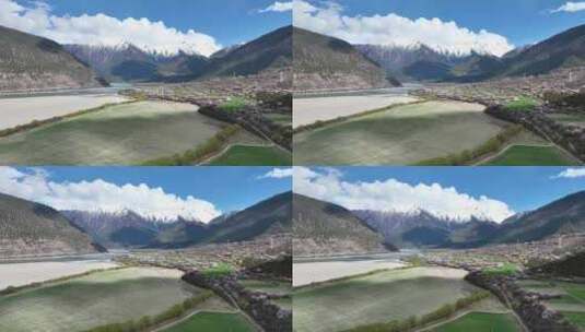 西藏林芝雪山桃花花海和乡村的田园风光高清在线视频素材下载