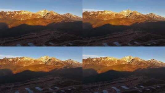 航拍玉龙雪山日照金山的日出高清在线视频素材下载