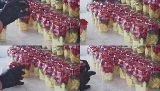 商店出售塑料容器中的菠萝奇异果和草莓高清在线视频素材下载
