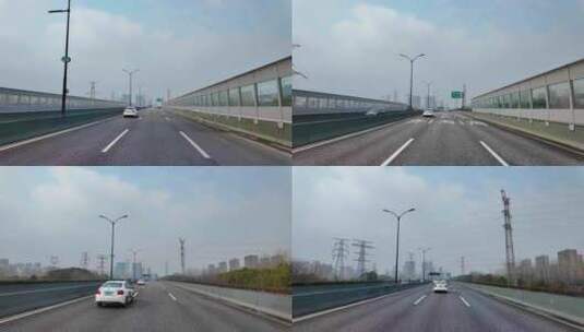 城市马路沿途风景开车第一视角道路公路素材高清在线视频素材下载