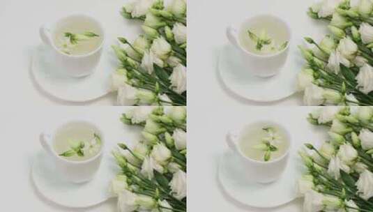 花茶。白色杯子里有芬芳的凉茶和Eusto高清在线视频素材下载