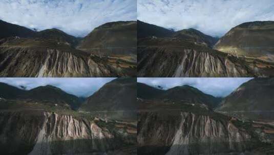 4k延时西藏大山视频丙察察沟壑峭壁云层变化高清在线视频素材下载