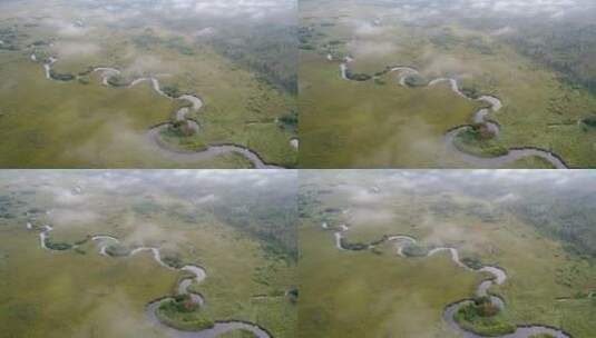 航拍原野晨雾蜿蜒的河流高清在线视频素材下载