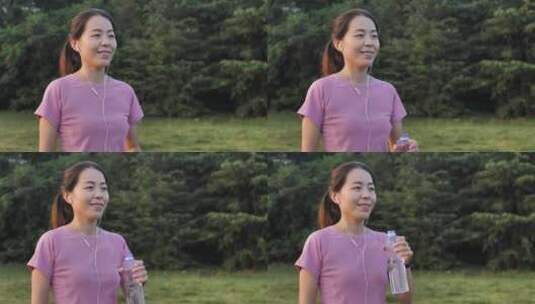 亚洲中国女性女士带耳机运动前后热心运动高清在线视频素材下载