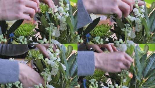 花瓶中排列白玫瑰、菊花和树叶高清在线视频素材下载