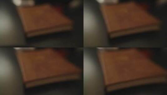 棕色封面的书模糊镜头高清在线视频素材下载