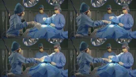 助手把手术器械递给医生高清在线视频素材下载