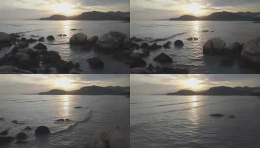 日落时分的岩石和大海高清在线视频素材下载