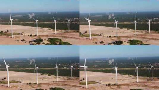 航拍平原上的风力发电机高清在线视频素材下载