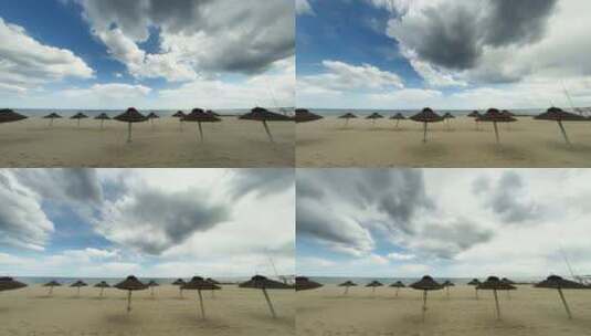 阴天时光流逝，美丽的热带海滩上的稻草伞高清在线视频素材下载