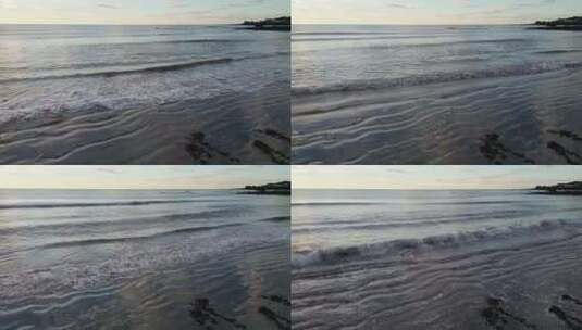 傍晚海岸边沙滩海浪高清在线视频素材下载