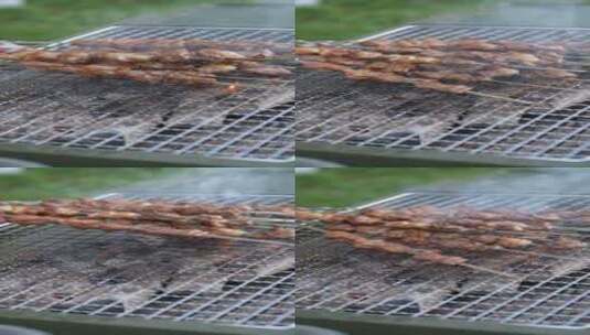 户外晒烤炉炭火羊肉串冒烟慢动作高清在线视频素材下载