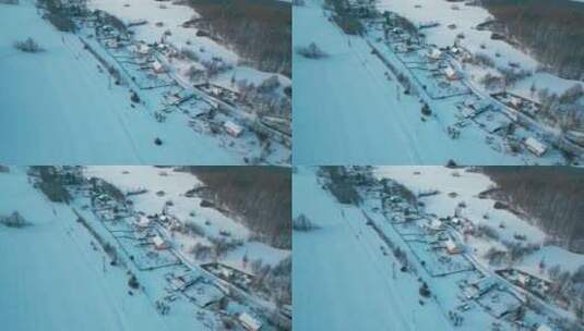 航拍白雪森林中的村庄小镇雪景雪乡村庄高清在线视频素材下载