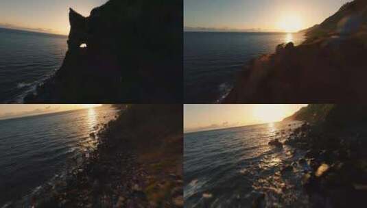 fpv无人机穿过洞口航拍海边日出高清在线视频素材下载
