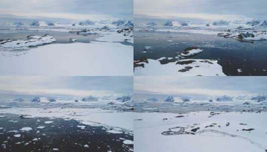 南极洲雪海岸线上空的空中飞行。高清在线视频素材下载