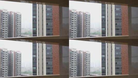雨天的城市住宅楼实拍高清在线视频素材下载
