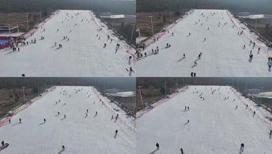 户外滑雪场中许多人在滑雪的热闹景象高清在线视频素材下载