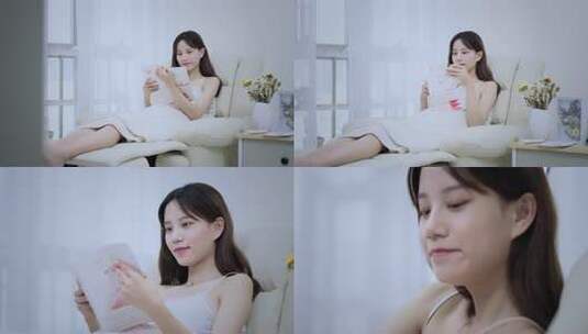 文艺女生看书喝水 美女看书高清在线视频素材下载