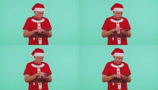 穿着圣诞装的老人做出胜利的手势高清在线视频素材下载