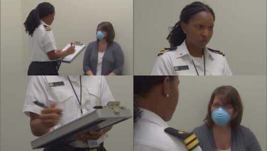 一名旅客在机场检疫期间被疾控中心官员检查疾病高清在线视频素材下载