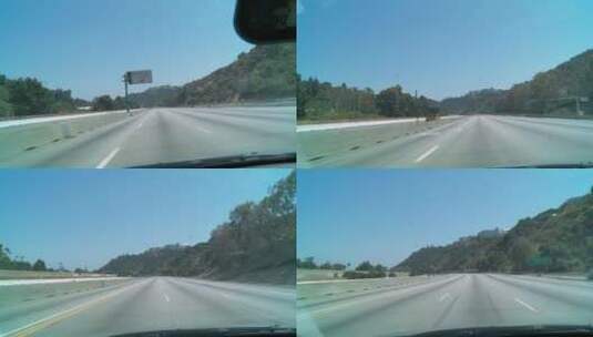 汽车在洛杉矶一段空旷的高速公路上行驶的第一视角拍摄高清在线视频素材下载