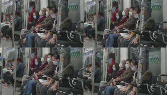 戴口罩坐地铁玩手机高清在线视频素材下载