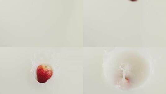 慢镜头拍摄新鲜爆浆草莓落入牛奶创意视频高清在线视频素材下载