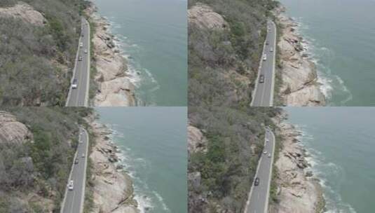 航拍跟随海边公路汽车高清在线视频素材下载