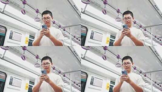 男子在地铁上用手机玩手机高清在线视频素材下载