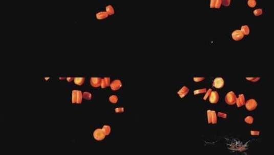 一片片胡萝卜落下溅起水花高清在线视频素材下载