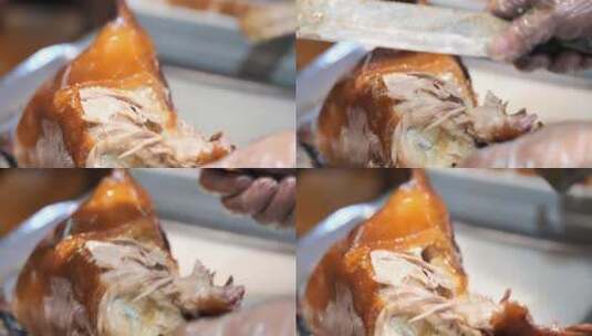 厨师用刀片烤鸭肉高清在线视频素材下载