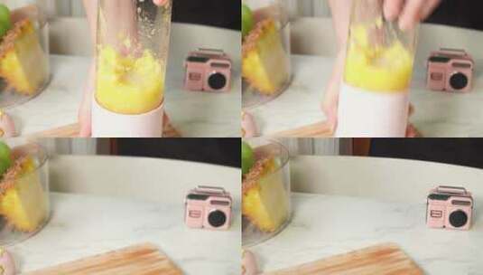 菠萝加入榨汁机榨菠萝汁高清在线视频素材下载