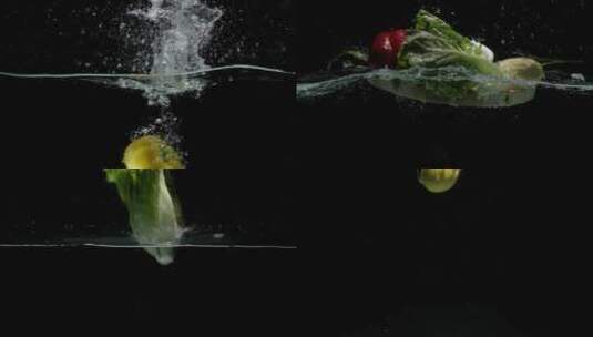 新鲜蔬菜浸水落入水中展示素材高清在线视频素材下载