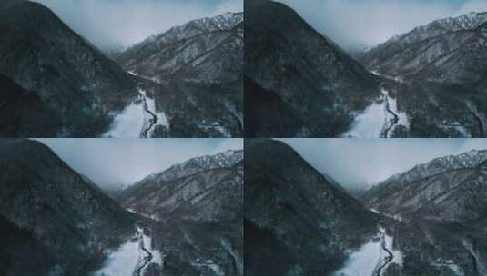 冬季飘雪的山脉天际线景观高清在线视频素材下载