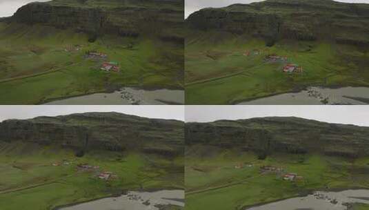 河流和山下房屋的小村庄鸟瞰图高清在线视频素材下载
